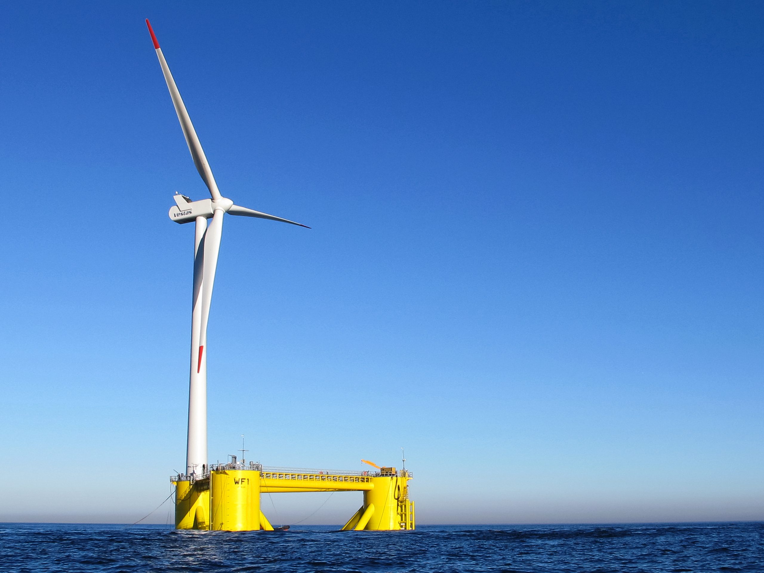 Floating wind turbine at sea, illustration