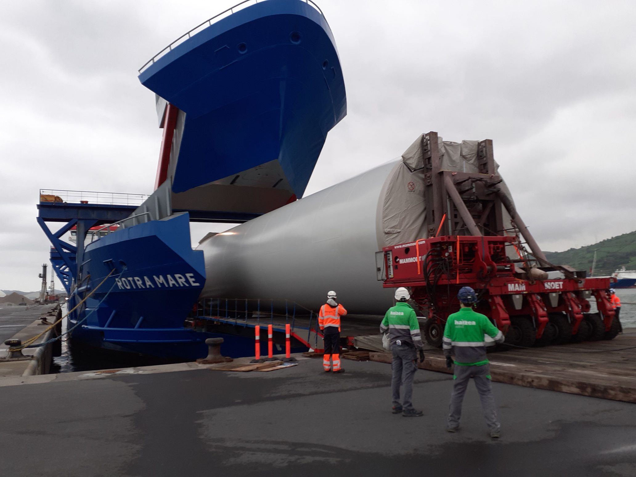 Haizea wind turbine tower being loaded onto Rotra Mare vessel