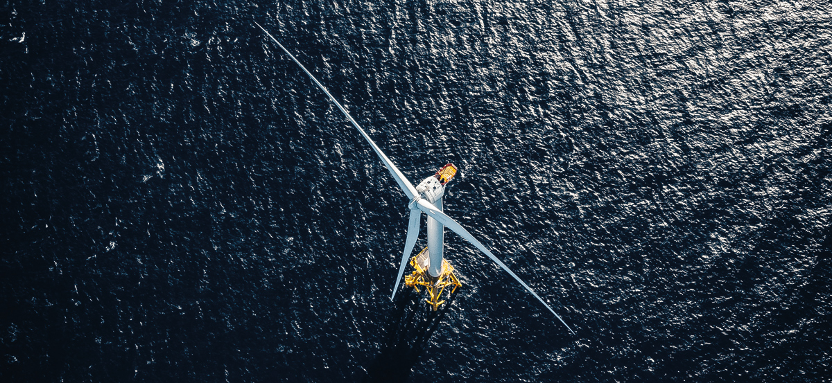 An aerial photo of a GE offshore wind turbine installed at sea