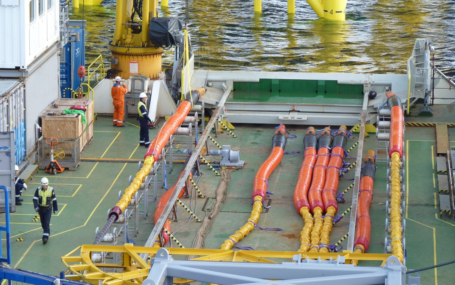 A photo of subsea cables on a vessel during cabling operations