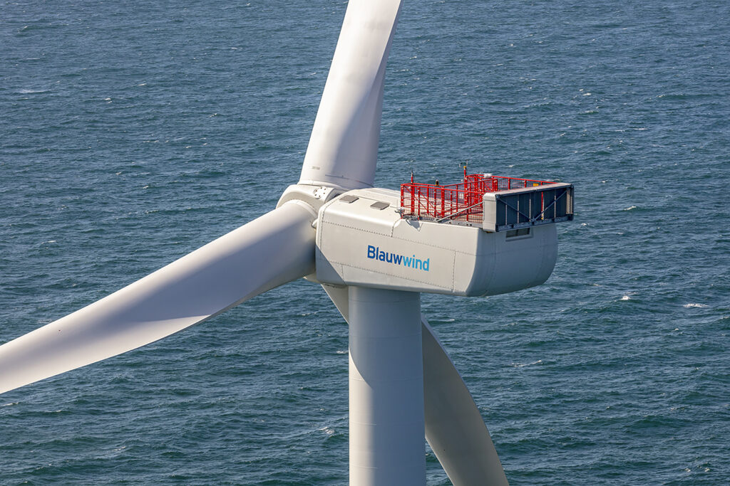 Close-up of one of the Borssele III & IV turbines, aerial view with rotor in focus