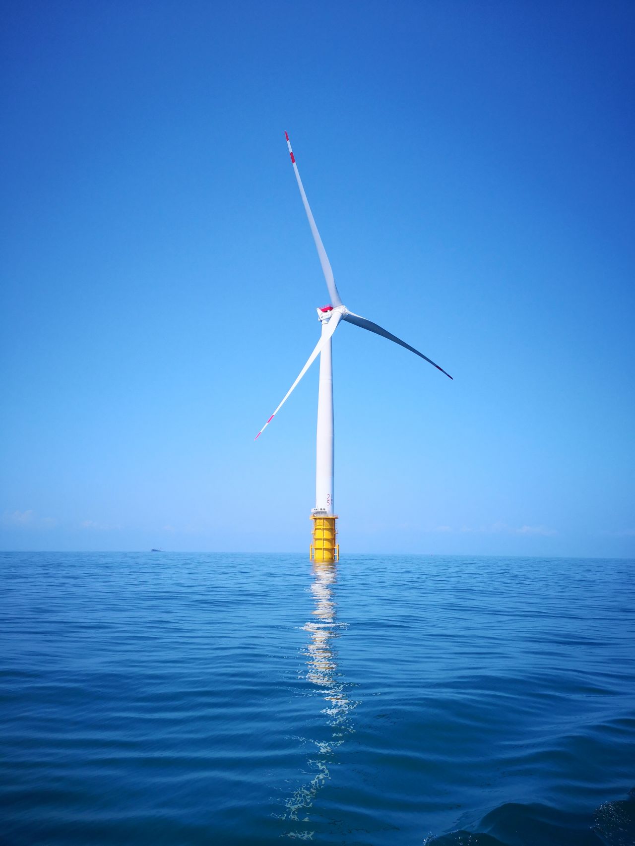 A photo of a MingYang offshore wind turbine installed at sea