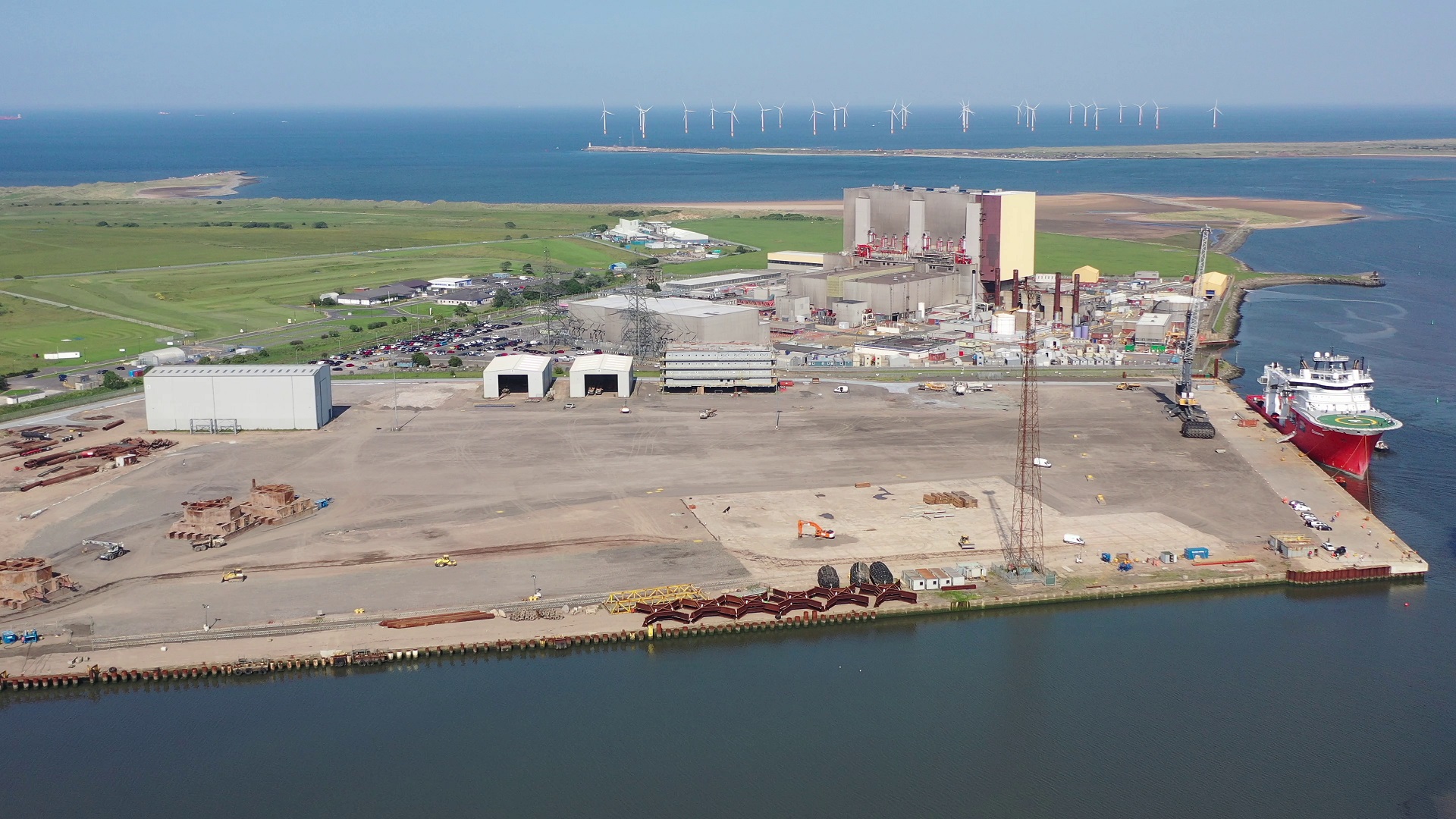 Aerial photo of Able Seaton port where marshaling harbour activities for the world's biggest offshore wind farm