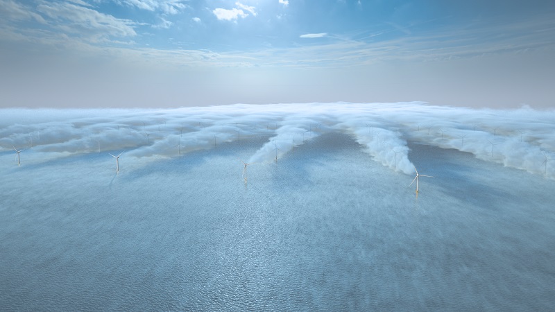 Wind turbines at sea with a wake visible behind each