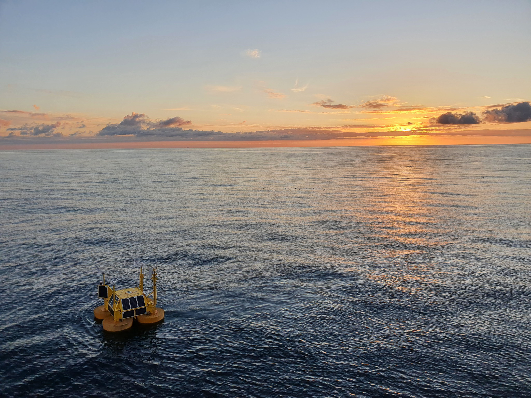 EOLOS yellow floating LiDAR at the Erebus site at sunset