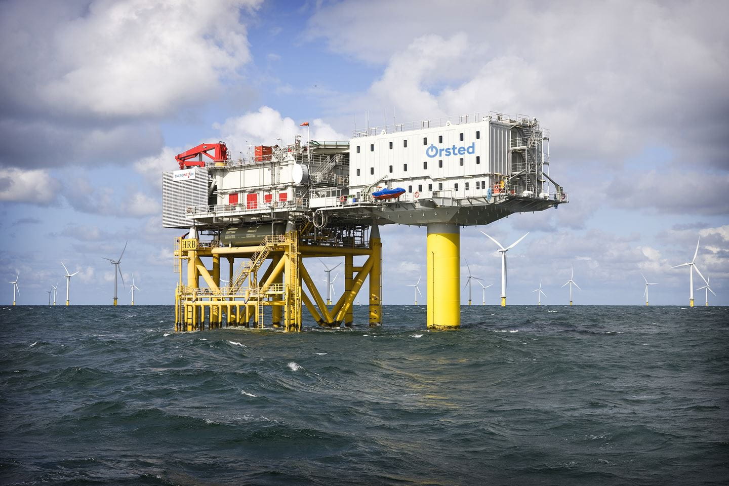 The Horns Rev 2 platform with the offshore wind farm in the background