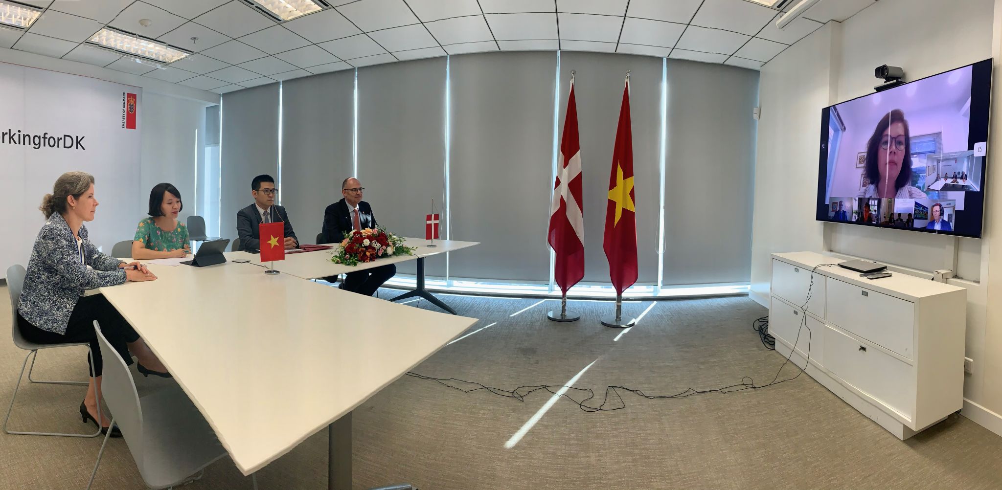A photo from the virtual signing ceremony under witness by the Danish ambassador to Vietnam H.E. Mr. Kim Højlund Christensen.