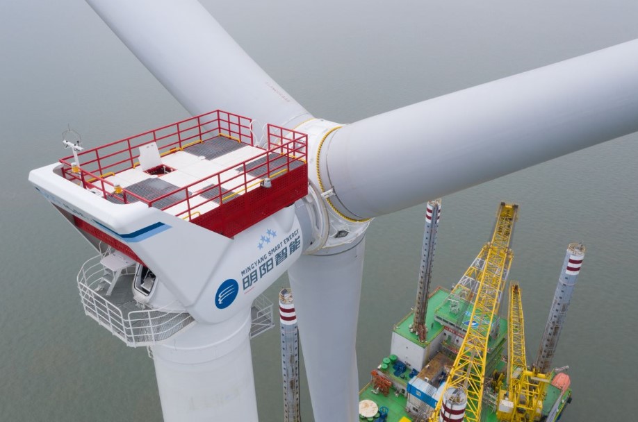 An aerial photo of a Ming Yang wind turbine being installed at Huadian Fuqing Haitan Strait offshore wind farm