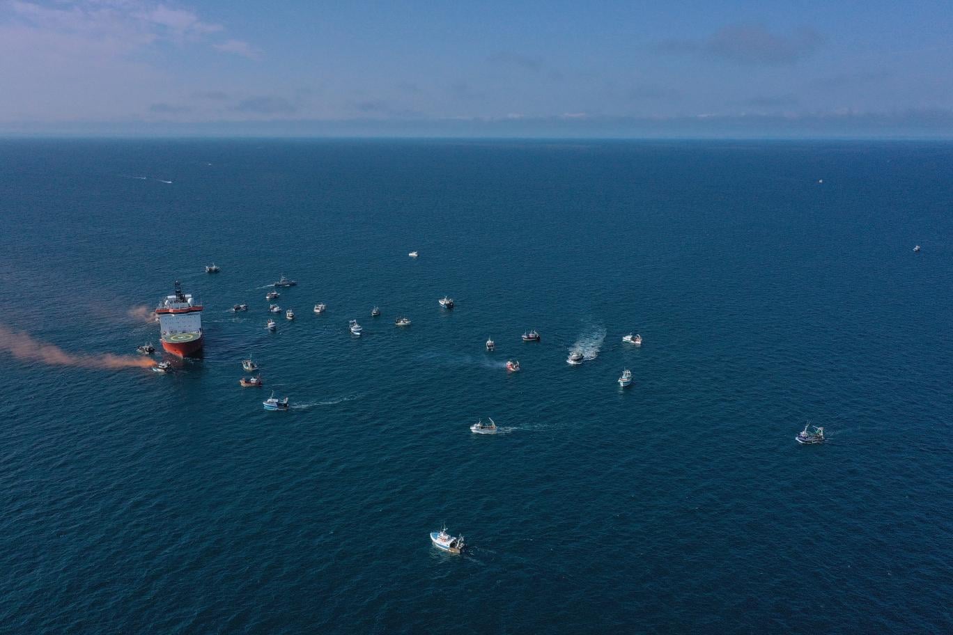 Aethra surrounded by French fishing boats at Saint-Brieuc offshore wind farm