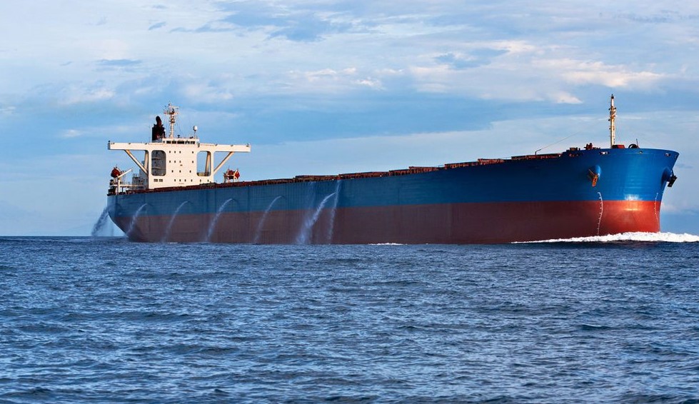 ship pumping out ballast water