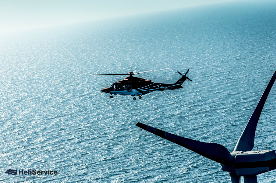 A photo of Heli Service helicopter at an offshore wind farm
