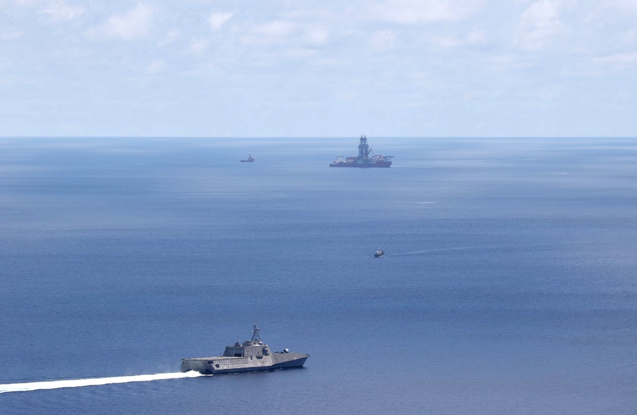 USS Montgomery and West Capella in the background; Photo by: Naval Aircrewmen Helicopter 3rd Class Christopher Fred 