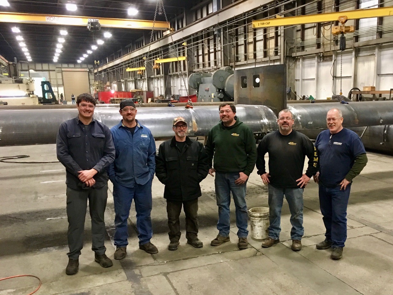 Downeast Machine and Engineering team members at the company’s Leeds, Maine, fabrication facility with ORPC engineer during building of structural components for ORPC’s first commercial RivGen device in December 2018.