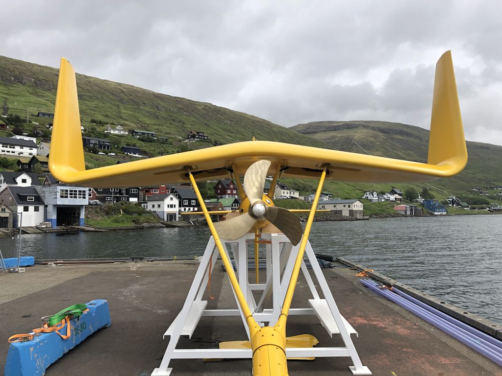 A photo of Minesto's DG100 system on the quayside in Vestmannsund, Faroe Islands (Courtesy of Minesto)