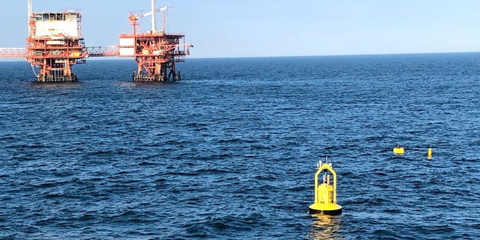 A photo illustration showing the PB3 PowerBuoy operating in the Adriatic Sea (Courtesy of Ocean Power Technologies)