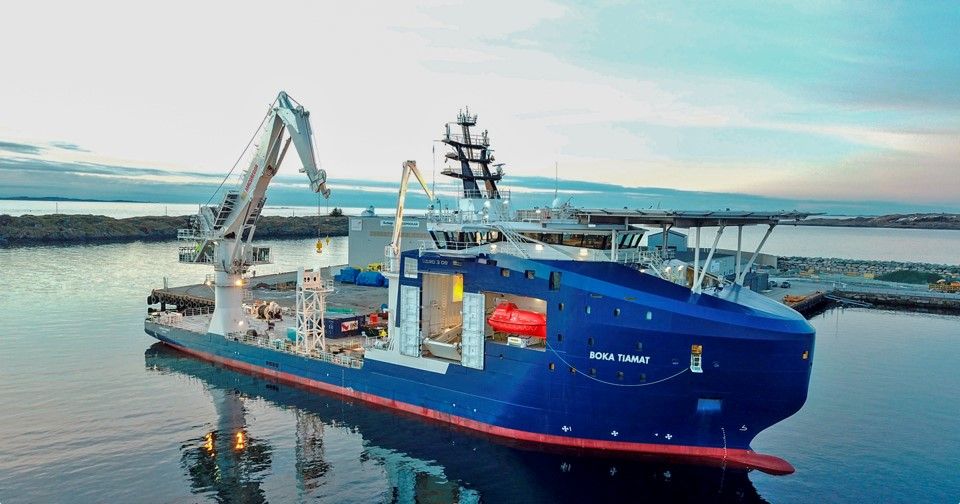 The blue Boka Tiamat vessel in water