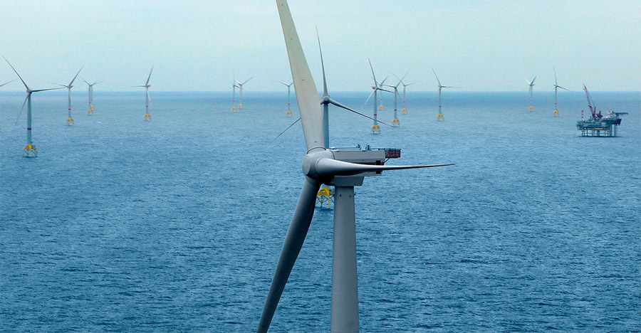 Wikinger offshore wind farm, aerial view with one turbine close up