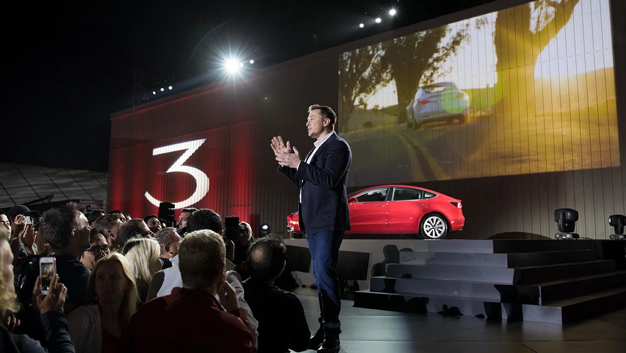 Elon Musk presenting the Tesla model 3