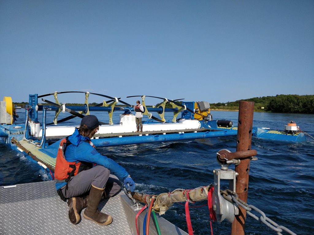 Photo of ORPC engineers at work during maintenance and retrieval of RivGen device (Courtesy of ORPC)