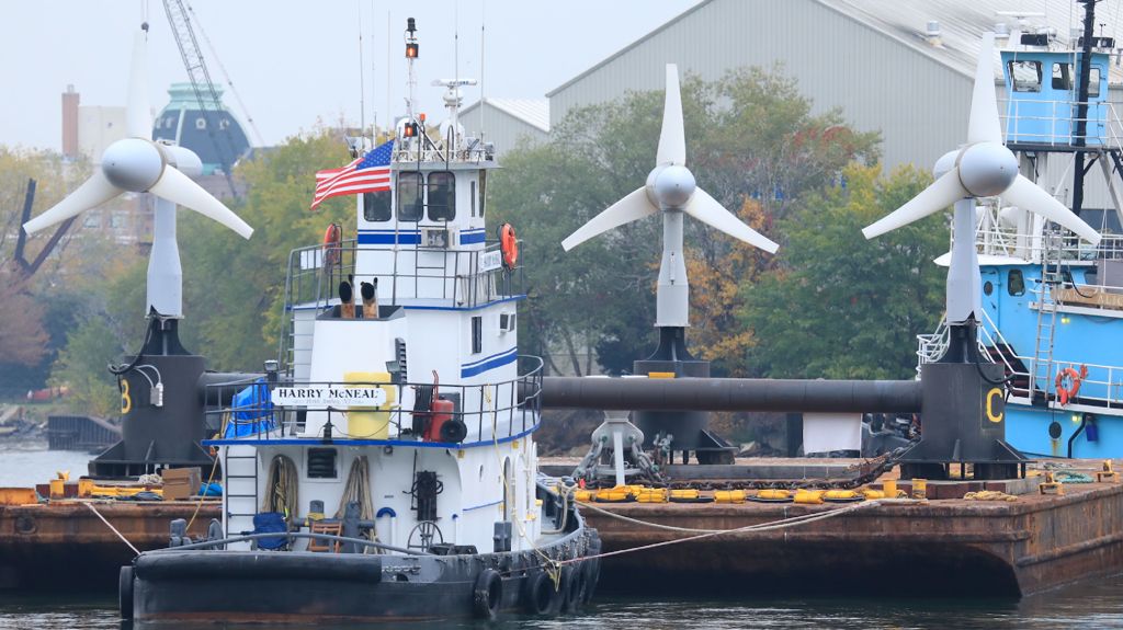 Photo showing the three turbines on the East River approaching the installation site (Courtesy of Verdant Power)