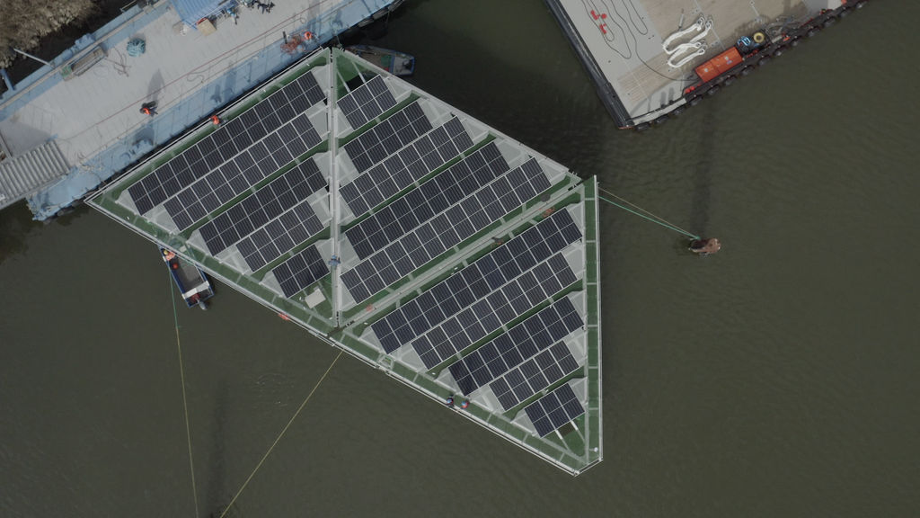 Photo showing triangular-shaped floating solar platform units being assembled at Damen Shipyards for SolarDuck (Courtesy of SolarDuck)