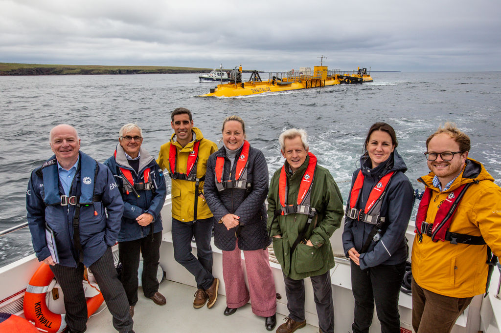 Group shot with UK energy minister at EMEC’s Fall of Warness tidal test site (Courtesy of EMEC/Photo by Colin Keldie)