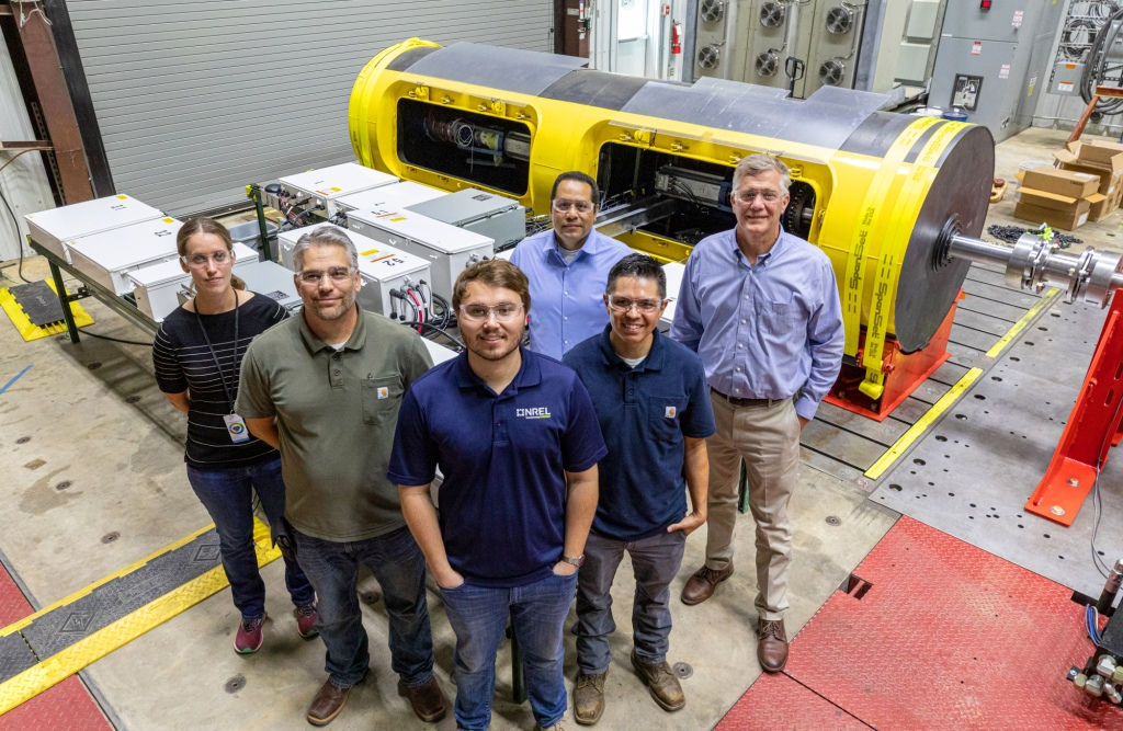 NREL researchers pictured in front of the SeaRAY AOPS (Courtesy of NREL/Photo by Vern Slocum)