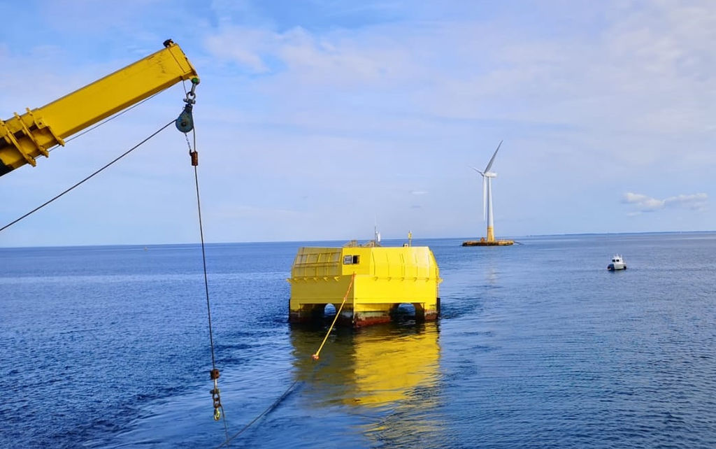 Photo showing WAVEGEM renewable energy hybrid being retrieved to shore (Courtesy of Geps Techno)