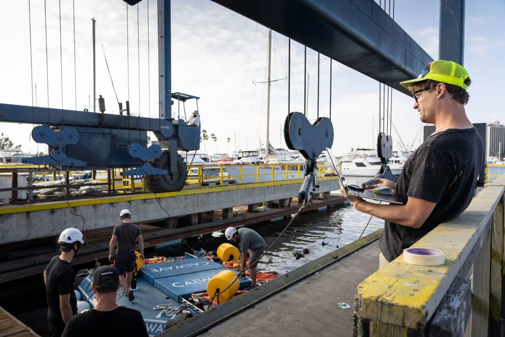 CalWave's team working on the deployment of x1 wave energy prototype (Courtesy of CalWave Power Technologies)