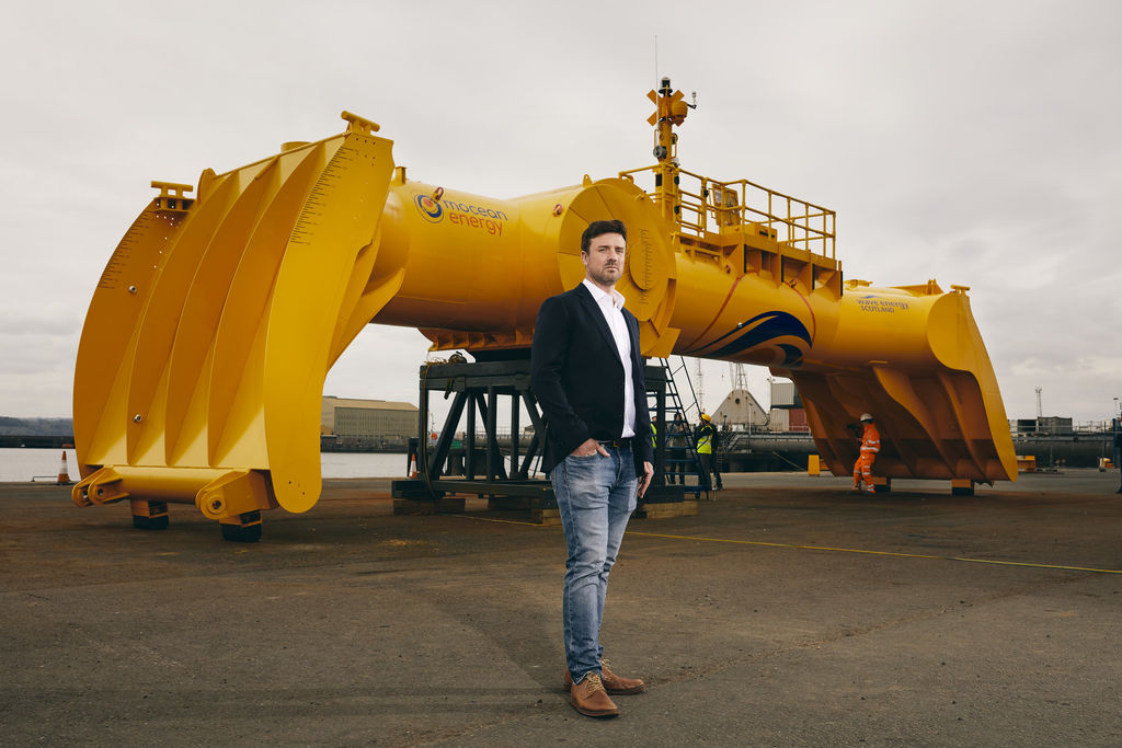 Cameron McNatt with Blue X wave energy prototype (Courtesy of Mocean Energy)