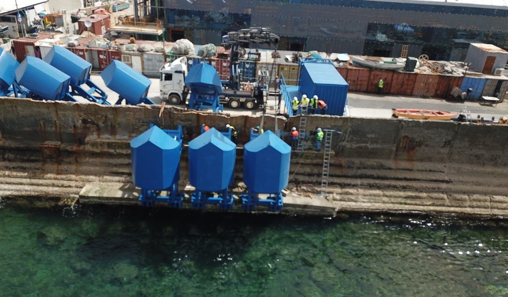 The installation of wave energy floaters for EWP-EDF One project in Israel (Courtesy of Eco Wave Power)