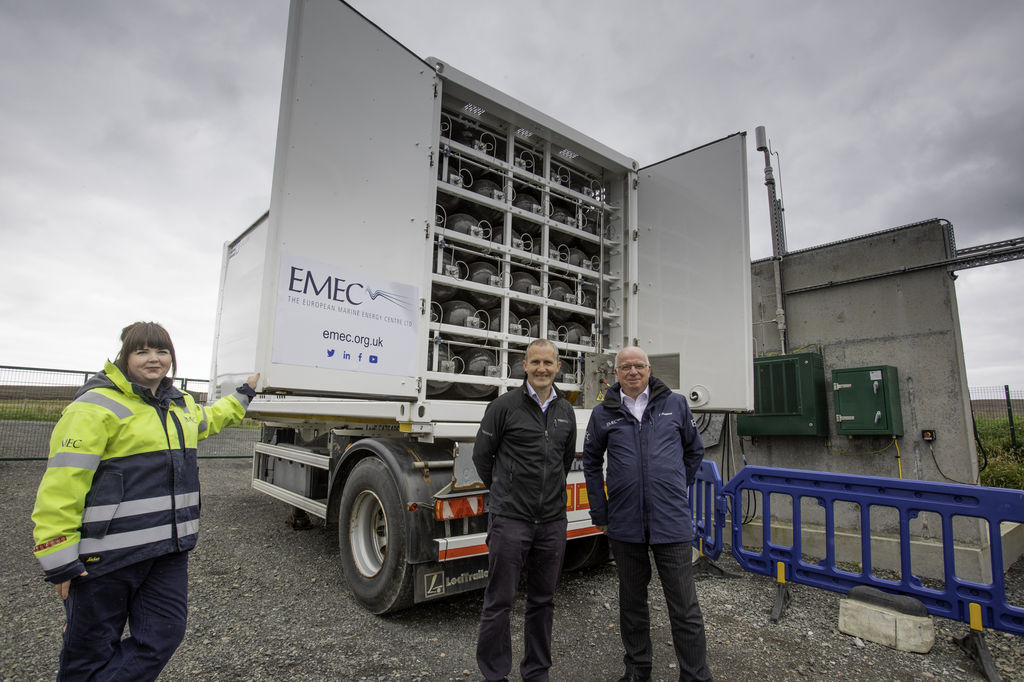 Michael Matheson at EMEC site on Eday with hydrogen transport trailer (Courtesy of EMEC)