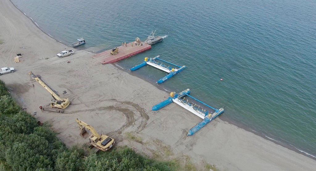 Illustration/Two RivGen devices side by side on the shore of Lake Iliamna, near project site on Kvichak River (Courtesy of ORPC)