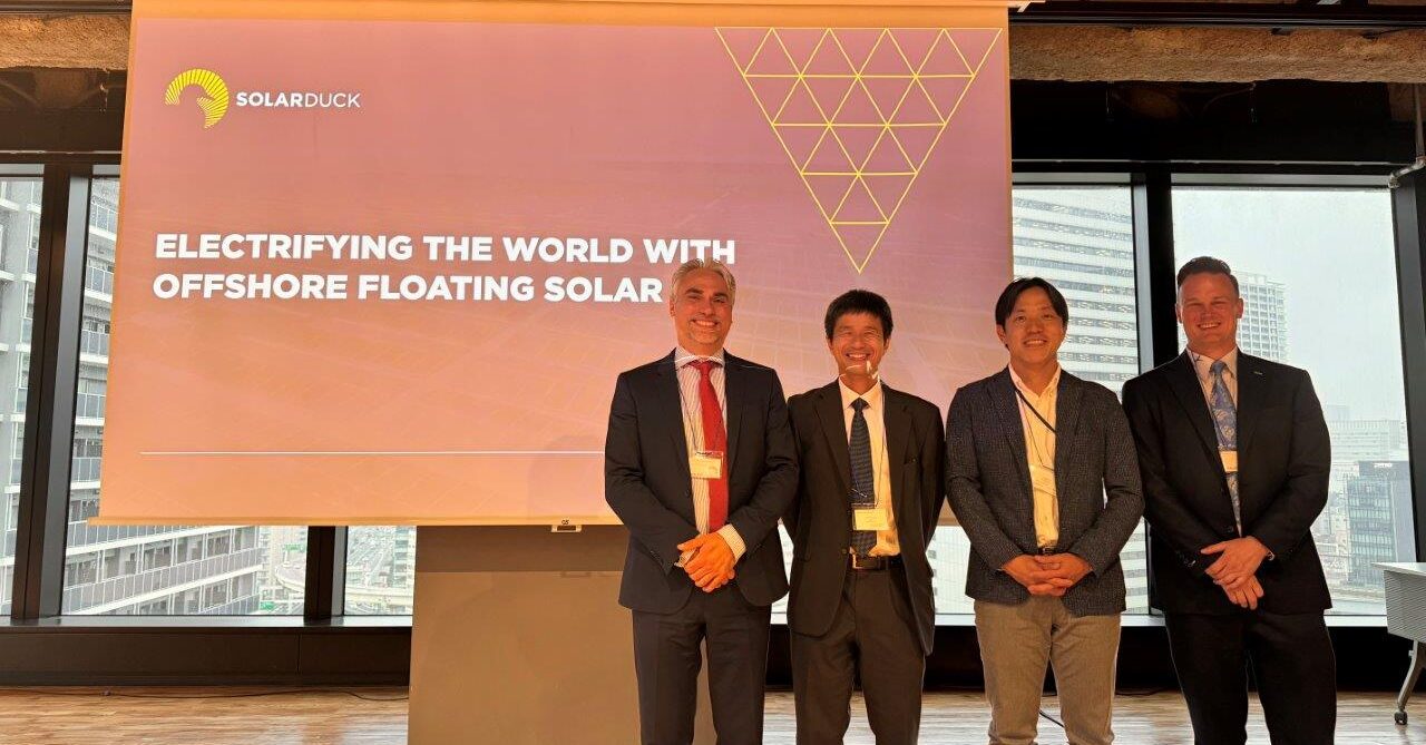 four men in suits gather for opening of SolarDuck's new office in Tokyo