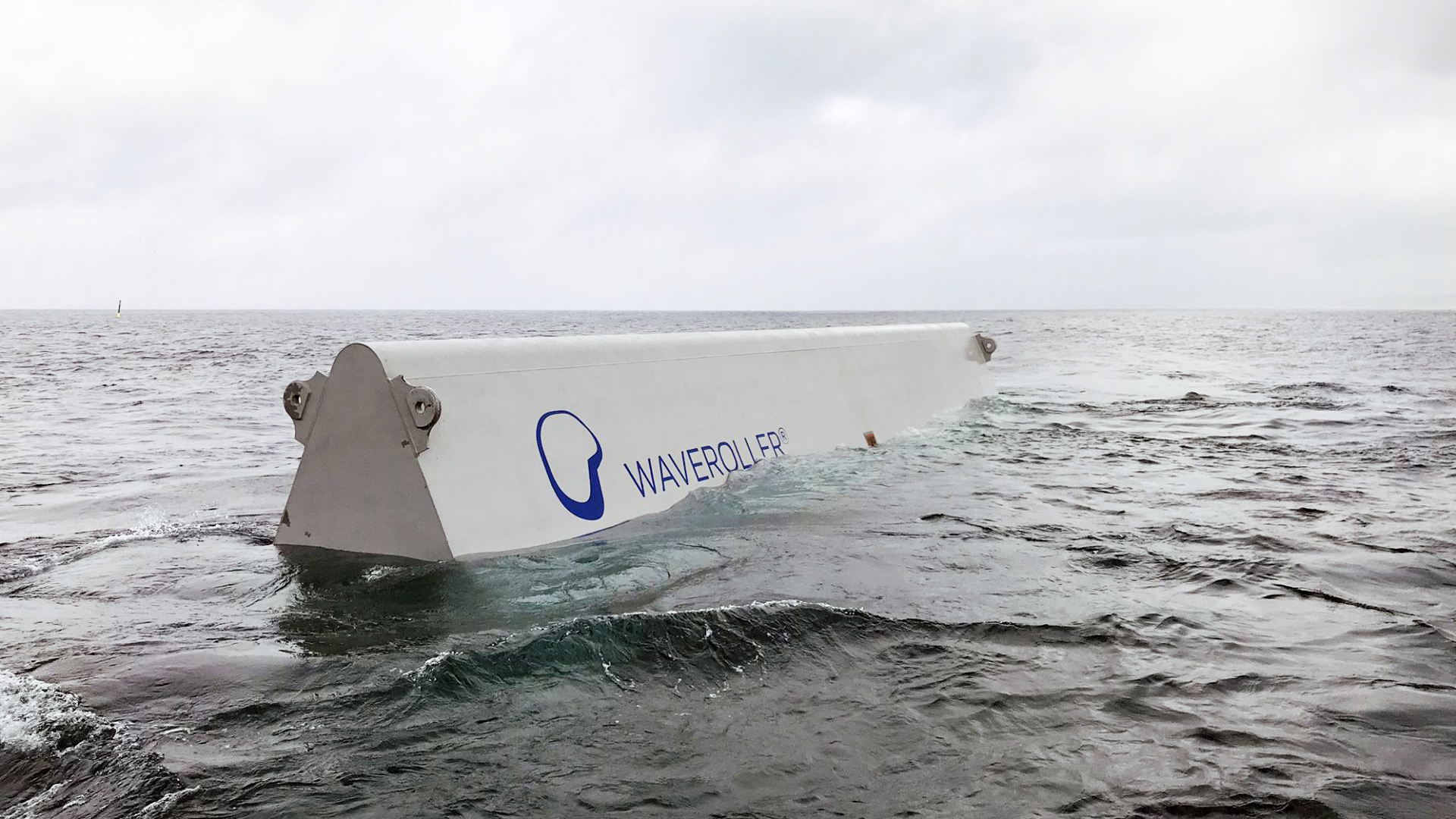 WaveRoller, a white and blue wave energy converter in the sea