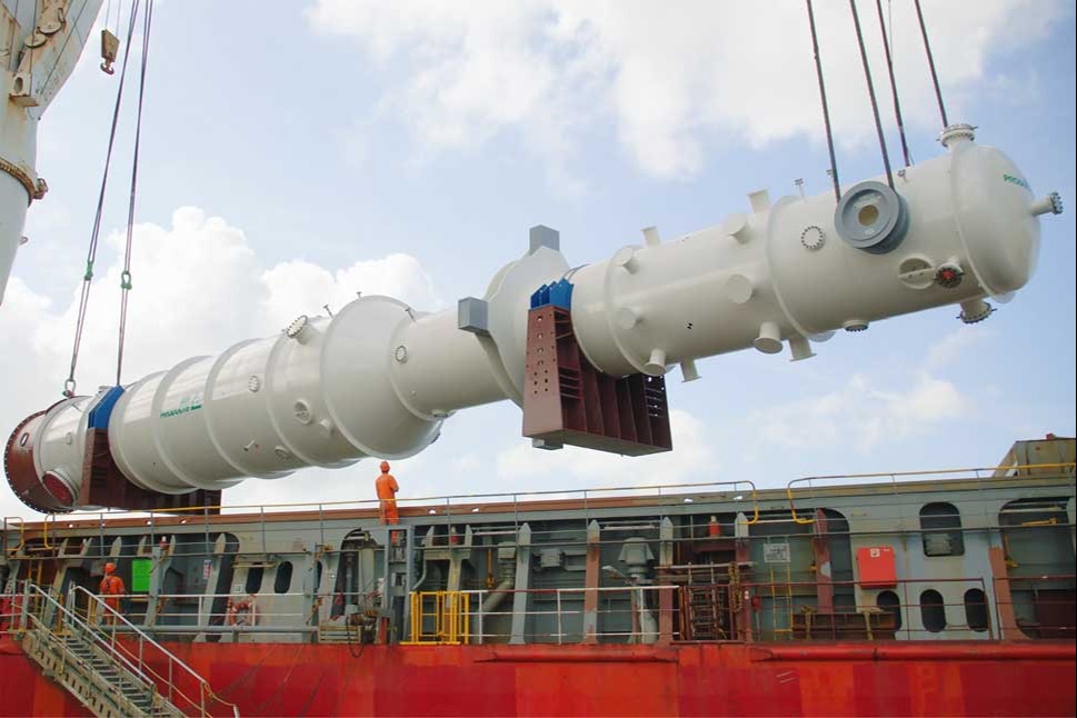 A heat exchanger being loaded onto a ship