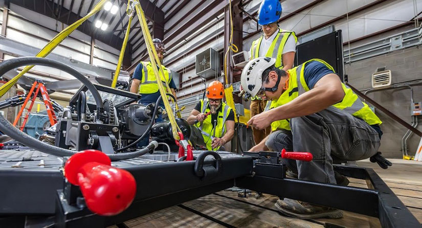 The team will test the resiliency of a polyurethane flat belt with fatigue simulations on the large-amplitude motion platform located at NREL’s Flatirons Campus in Colorado. Image by Josh Bauer, NREL