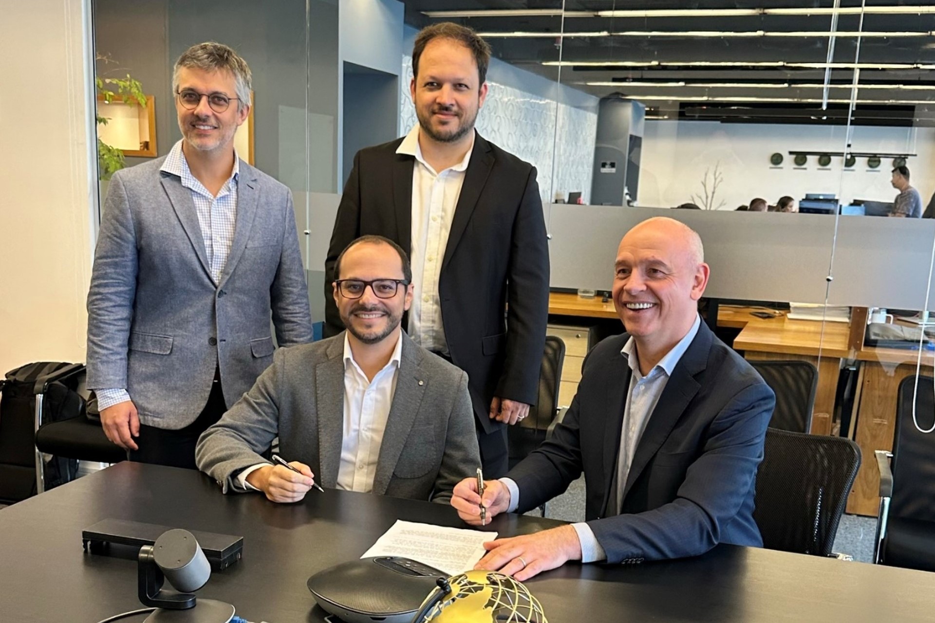 (left to right – standing): Bernardo Xavier, operations director, Proper Marine; Guilherme Leal, engineering director, Proper Marine; (sitting) Hugo Jordao, finance & business development director, Proper Marine; Reuben Segal, CEO of ABL Group ASA.