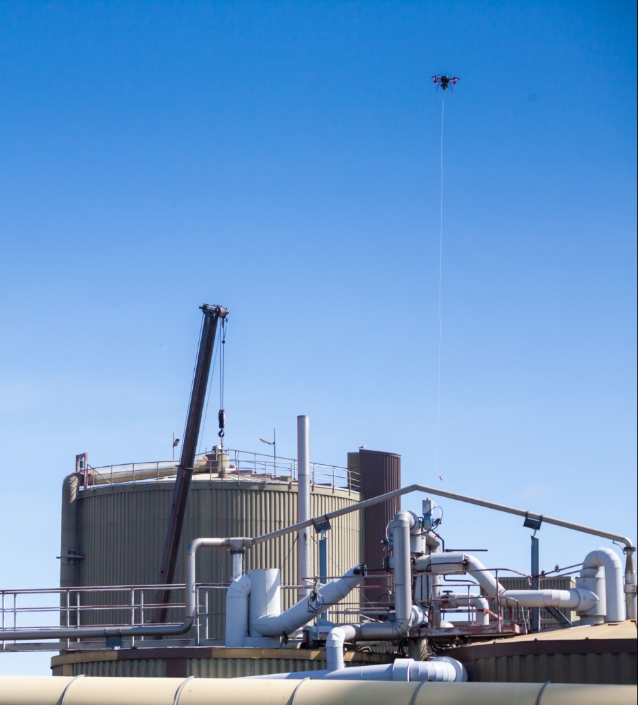 A drone flying over a processing facility