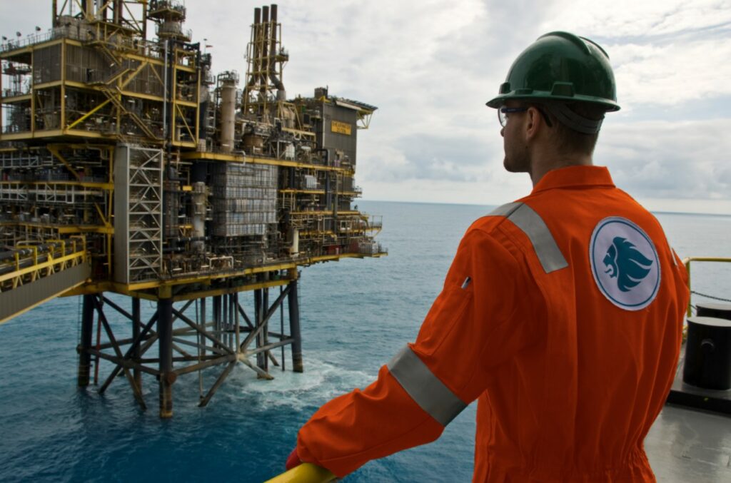 Man looking at an offshore platform