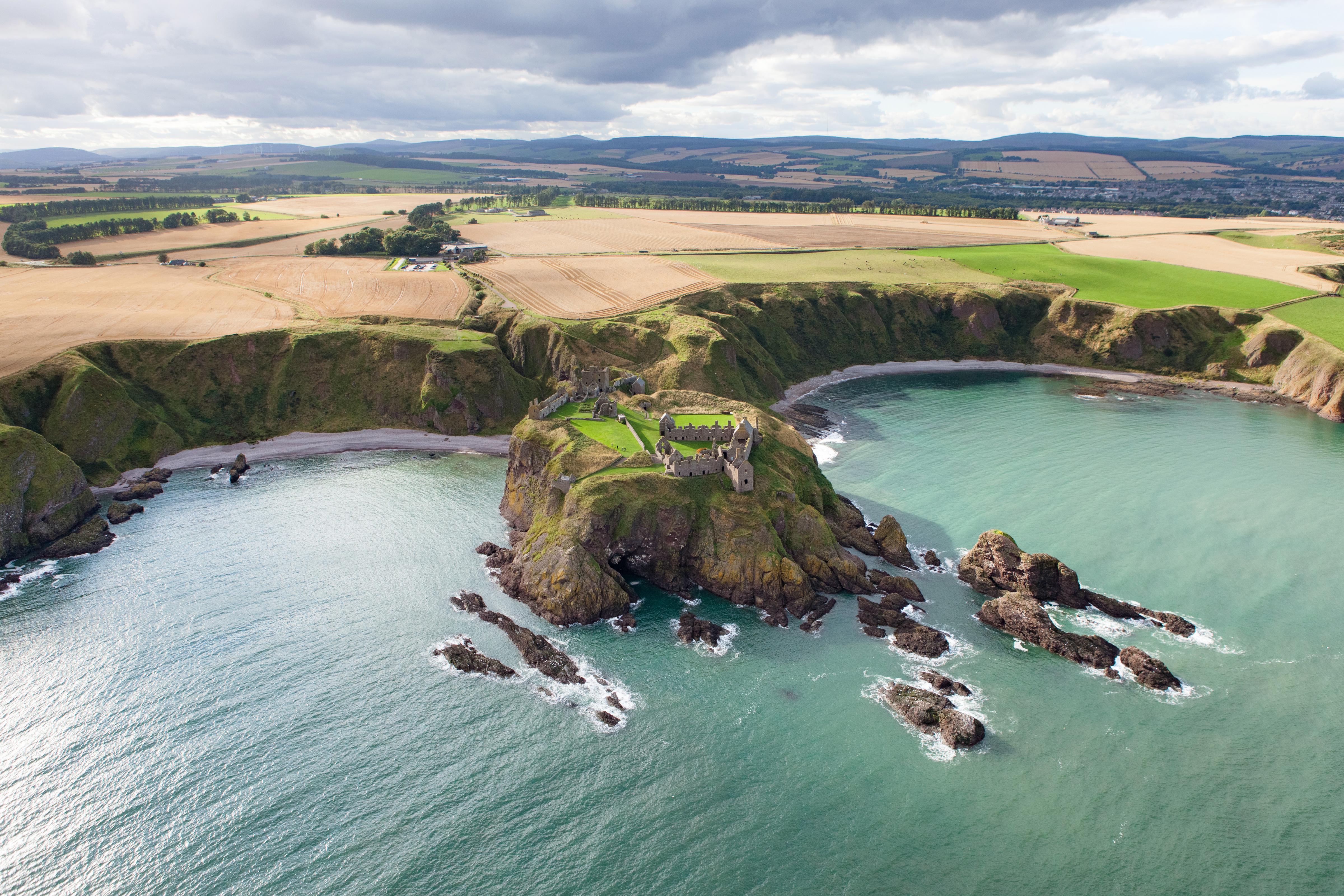 Aerial view of Dunnottar Castle, Stonehaven. Dunnottar is a ruined medieval fortress located upon a rocky headland on the North East coast of Scotland. Credit: Scottish Enterprise