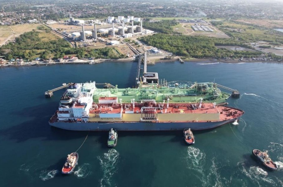 Two large vessels at berth by the coast