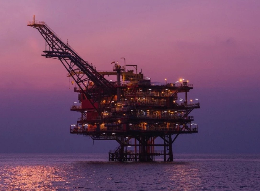 An offshore platform at sunset