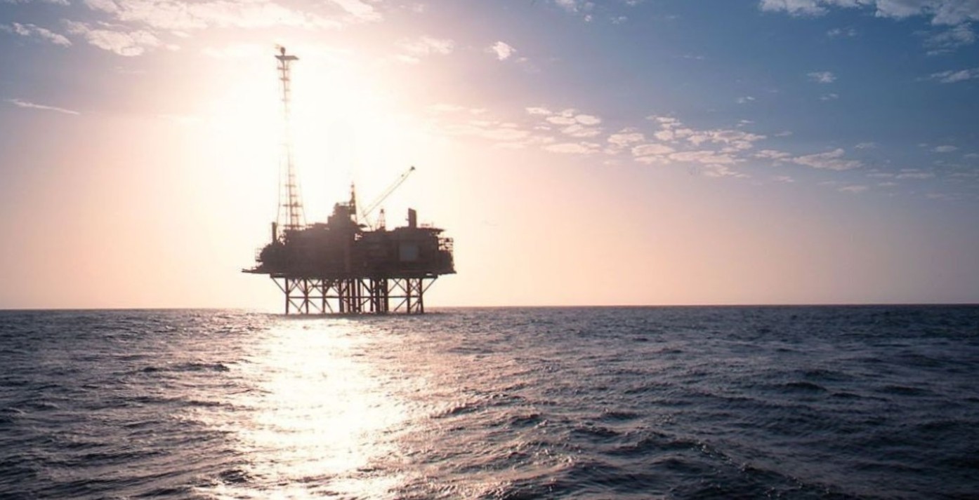 An offshore platform at sunset