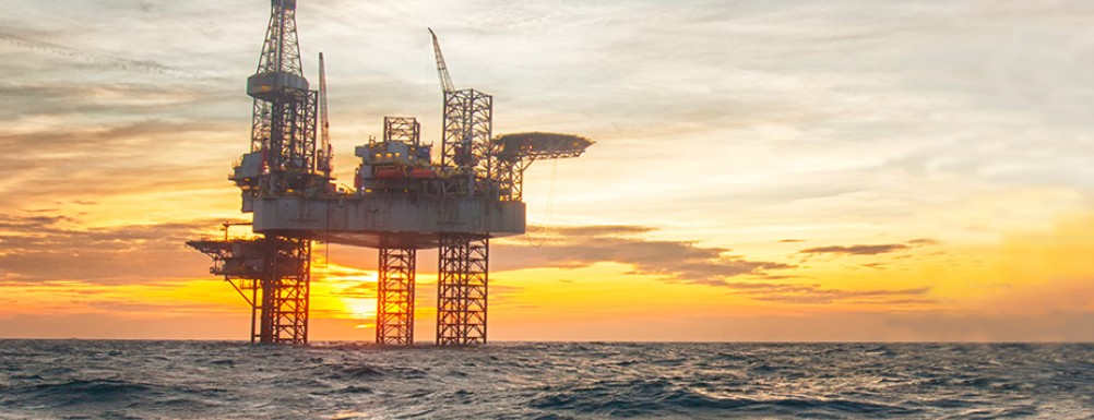 An offshore platform at sunset