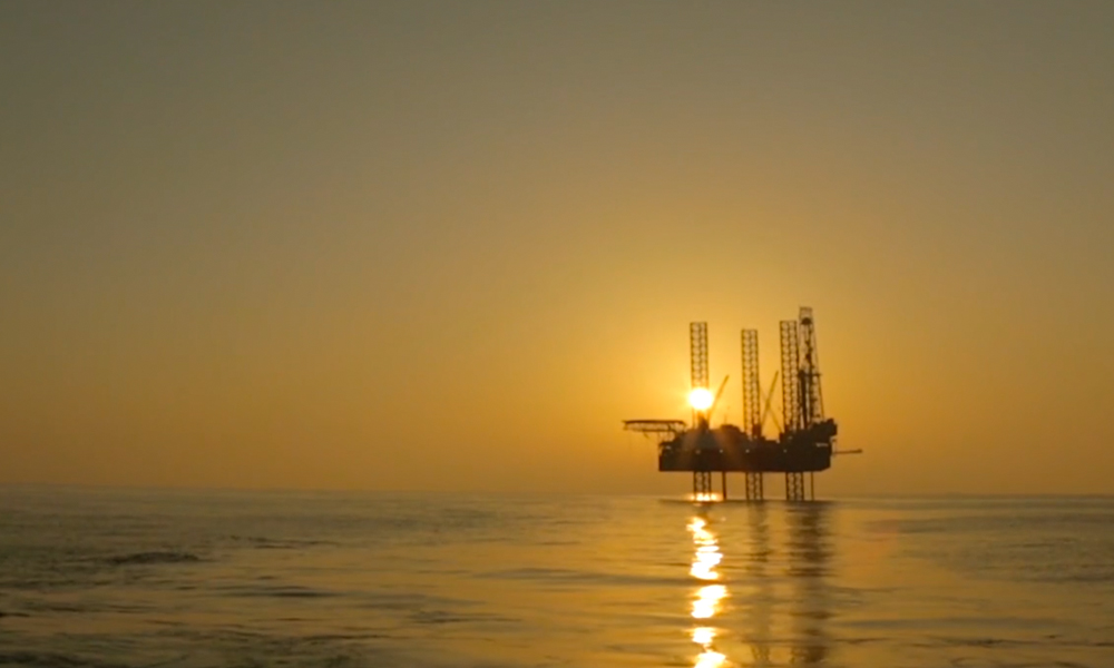 An offshore platform at sunset