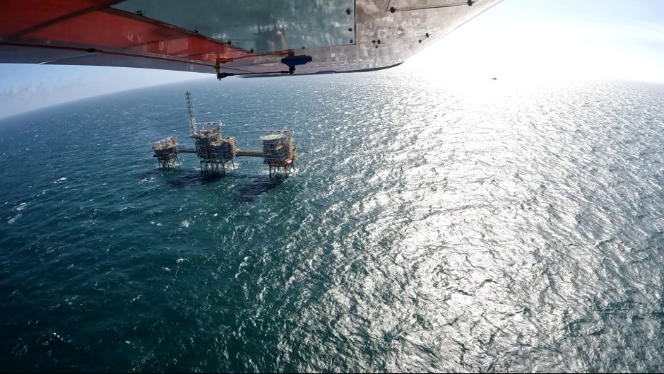 A drone overlooking an oil & gas platform