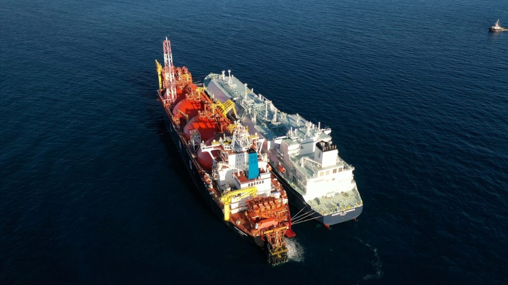 Two vessels side by side at sea