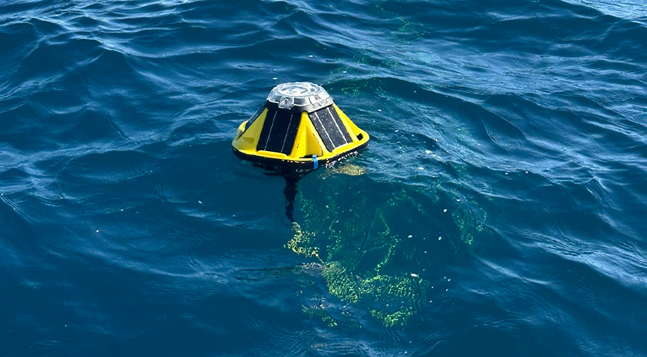 yellow wave buoy in open sea